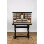 A Spanish partly ebonised wooden cabinet with tortoiseshell veneer and engraved bone plaques, 19th C