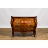 A French Louis XV-style rosewood marquetry chest of drawers, 20th C.