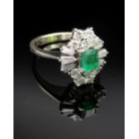 18CT WHITE GOLD EMERALD & DIAMOND CLUSTER RING, the central emerald (5 x 4mms approx.) surrounded by