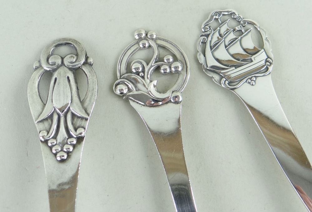 THREE DANISH SILVER SPOONS, Johannes Siggaard 1937 & 1938, with pierced ship handle top, berry