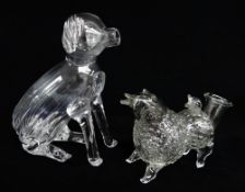 TWO NOVELTY GLASS ANIMAL FLASKS, comprising a seated spaniel, 18cms h, and a standing sheep 15cms