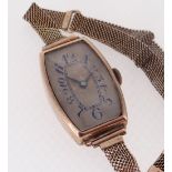 9CT GOLD LADIES ART DECO-STYLE SWISS WRISTWATCH, c. 1923, tonneau case and silvered dial with blue