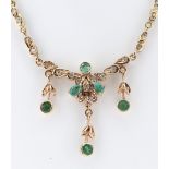 YELLOW GOLD EMERALD & DIAMOND NECKLACE, of leaf and foliate design, stamped '750', 42.5cms long,