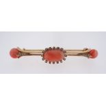 YELLOW METAL CORAL & DIAMOND BAR BROOCH, 6.3cms long, 10.0gms, in Morgan of Neath jewellery box