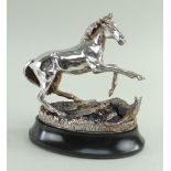 CAST SILVER MODEL OF A HORSE, 'Startled Yearling' by Geoffrey Snell on oval base, produced for The