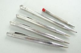 FIVE SILVER PROPELLING PENCILS, including Eversharp and Yard-o-Lead (5)