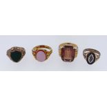 ASSORTED RINGS comprising 15ct gold sardonyx ring, together with three yellow metal rings