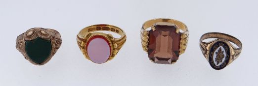 ASSORTED RINGS comprising 15ct gold sardonyx ring, together with three yellow metal rings