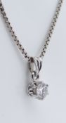 18K DIAMOND PENDANT on white gold box link chain stamped '750', the single diamond measuring 0.25cts