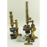 TWO 19TH CENTURY MONOCULAR MICROSCOPES, comprising one by E. Hart & E. Praz (Paris) lacquered