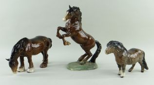 THREE BESWICK HORSES, comprising no. 1050 Shirehorse grazing,13.5cms; no. 1014 Rearing Welsh Cob,
