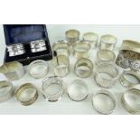 ASSORTED SILVER NAPKIN RINGS including a boxed pair of Edward VII rings engraved with presentation