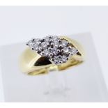 18CT YELLOW GOLD DIAMOND CROSSOVER RING, set with fourteen diamonds totalling 0.5cts approx.,