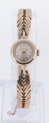 9CT GOLD LONGINES LADIES WRISTWATCH, having herringbone design 9ct gold bracelet, 17.8gms