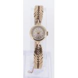 9CT GOLD LONGINES LADIES WRISTWATCH, having herringbone design 9ct gold bracelet, 17.8gms