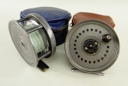 FISHING: TWO VINTAGE FISHING REELS by P D Malloch and J W Young 'Beaudex', with two non-matching