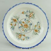 PRATT WARE CHARGER WITH LOBED & FEATHERED RIM centred with a painting of flower sprays in ochre,