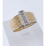 18CT YELLOW & WHITE GOLD FIVE-STONE DIAMOND RING, having textured shank, stamped 'K18', ring size O,