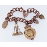 9CT GOLD BRACELET WITH BOXING TROPHY PENDANT & OTHER CHARMS the pendant inscribed 'Cardiff