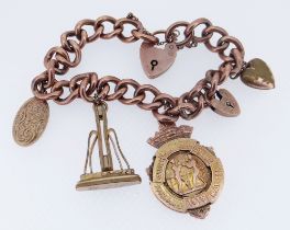 9CT GOLD BRACELET WITH BOXING TROPHY PENDANT & OTHER CHARMS the pendant inscribed 'Cardiff
