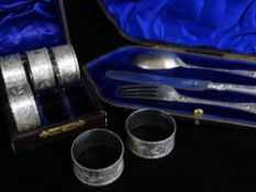 VICTORIAN BOXED SET OF NAPKIN RINGS, Matthew Boulton, Birmingham 1887, floral chase and numbered 1-6
