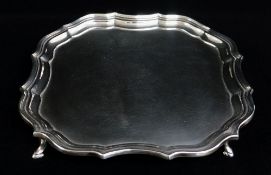 GEORGE V SILVER SALVER WAITER, Barker Bros., Sheffield 1917, shaped square on four scrolled legs,