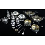 ASSORTED SILVER CRUETS, comprising pair of late Victorian rococo-style oval salts, two pairs of