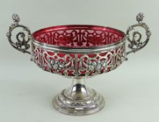 W. M. F. ELECTROPLATED COMPORT, pierced trellis and fruit embossed sides, caryatid scroll handled