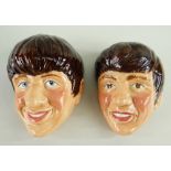 TWO KELSBORO WARE BEATLES WALL MASKS, c. 1964, depicting George and Ringo, impressed numerals 1 & 2,