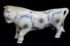 ARNOLD MACHIN FOR WEDGWOOD: Queensware model of 'Ferdinand the bull', c. 1941, painted blue and