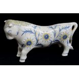 ARNOLD MACHIN FOR WEDGWOOD: Queensware model of 'Ferdinand the bull', c. 1941, painted blue and