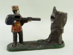 MECHANICAL CAST IRON 'GRENADIER BANK', painted details, 25cms long