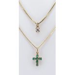 TWO YELLOW GOLD PENDANTS ON CHAINS comprising emerald crucifix on chain stamped '750', together with