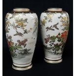 PAIR OF JAPANESE SATSUMA VASES, painted with Peony, Prunus, and Chrysanthemum, with birds in flight,