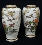 PAIR OF JAPANESE SATSUMA VASES, painted with Peony, Prunus, and Chrysanthemum, with birds in flight,