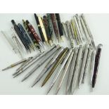 LARGE GROUP OF ASSORTED VINTAGE PROPELLING PENCILS, including coloured and plated metal examples (