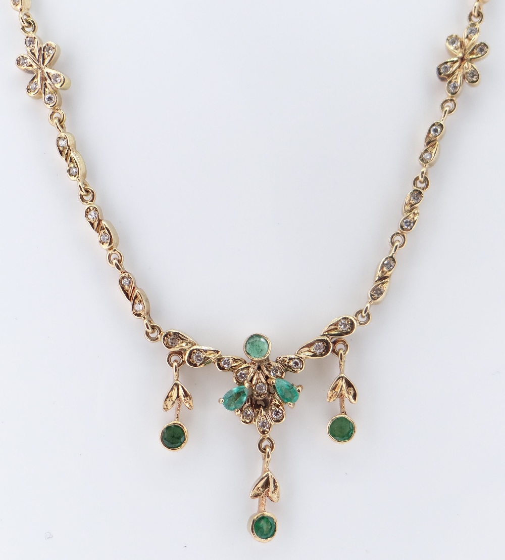 YELLOW GOLD EMERALD & DIAMOND NECKLACE, of leaf and foliate design, stamped '750', 42.5cms long, - Image 2 of 2