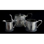 VICTORIAN SILVER THREE-PIECE TEA SET, P. Ashberry & Sons, Sheffield 1894, oval form with engraved