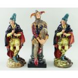 THREE ROYAL DOULTON FIGURES, comprising 'Jester' HN3016 , and 2x 'Pied Piper' HN2102 (3) Provenance: