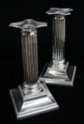 PAIR EDWARD VII SILVER CANDLESTICKS, Thomas A. Scott, Sheffield 1905, fluted form with beaded drip