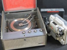 ULTRA PORTABLE RECORD PLAYER with Garrard turntable and a Eumig cine projector