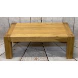 ULTRA-MODERN LIGHT OAK COFFEE TABLE on substantial corner supports, 45cms H, 122cms L, 72cms W