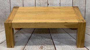 ULTRA-MODERN LIGHT OAK COFFEE TABLE on substantial corner supports, 45cms H, 122cms L, 72cms W