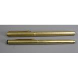 FOUNTAIN PENS (2) - a 1970s-80s Alfred Dunhill gold plated barleycorn patterned with gold plated