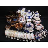 GAUDY WELSH TEAWARE, Victorian copper lustre jugs and a floral decorated part teaset