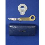 TIFFANY & CO 14CT GOLD CIGAR CUTTER/PENKNIFE, boxed and one other, marked 'Agoma Stainless Steel',