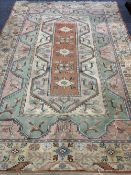 HAND KNOTTED TURKISH WOOLLEN CARPET, multi-colour with central repeating pattern block and wide