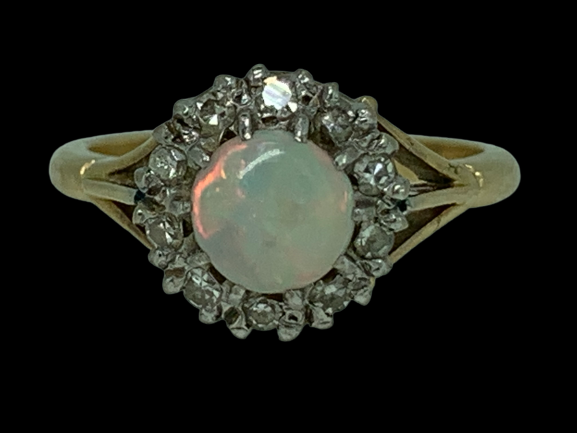 18CT GOLD OPAL & DIAMOND RING SIZE M - 4.2grms, the central opal surrounded by 10 diamonds in an