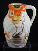 CLARICE CLIFF 'RHODANTHE' SINGLE HANDLE LOTUS JUG, signed 'Clarice Cliff' with Wilkinson Ltd,