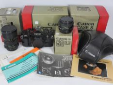 CANNON A1 SLR CAMERA BODY & ASSOCIATED EQUIPMENT - No 1821895 with original warranty card and